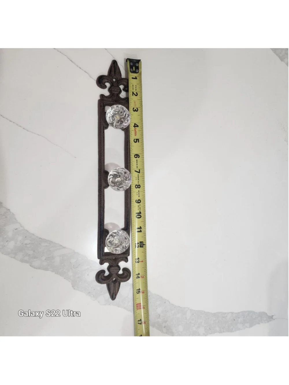 Cast Iron Fleur-de-lis wall mount with 3 crystal looking knobs 15.5”